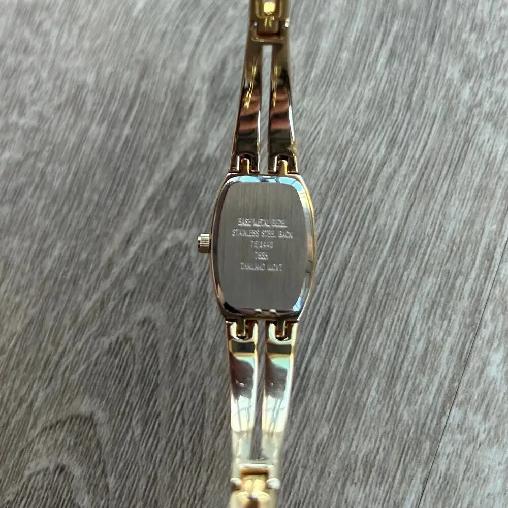 Armitron Diamond Now Blue Dial Gold Tone Bangle Watch